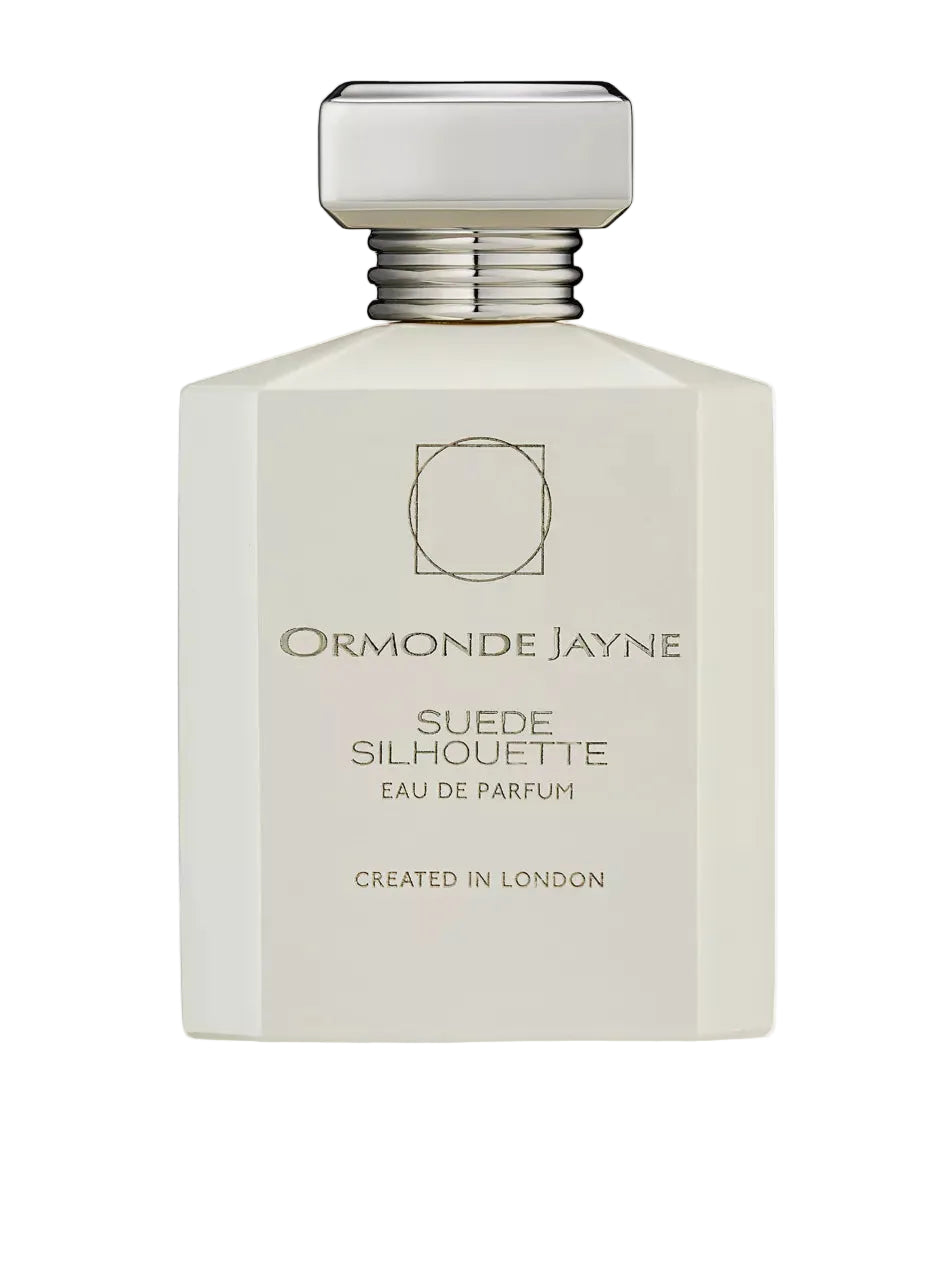 Ormonde Jayne Suede Silhouette Eau de Parfum in a matte off-white bottle with a silver faceted cap, shown on a light gray background.