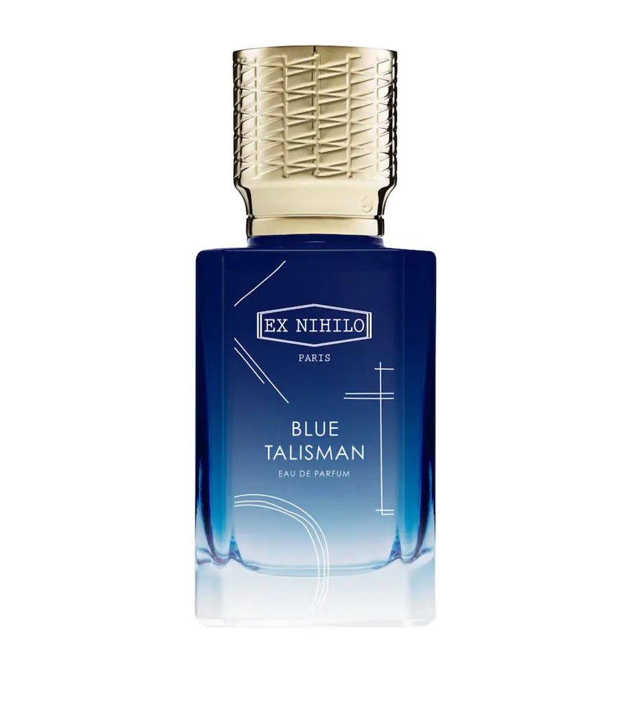 blue ex nihilo ble talisman bottle with a gold cap on a white background 