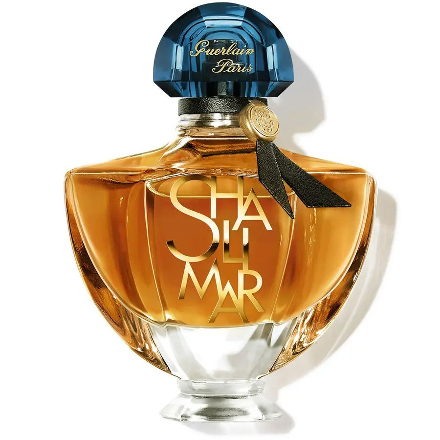 clear guerlain shalimar l'essence bottle with navy crystal cap