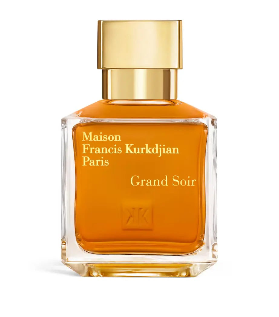 maison francis kurkdjian grand soir edp glass bottle with a gold cap on a white background