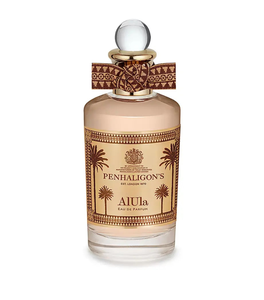 penhaligons al ula glass bottle with a glass cap with brown accents on a white background
