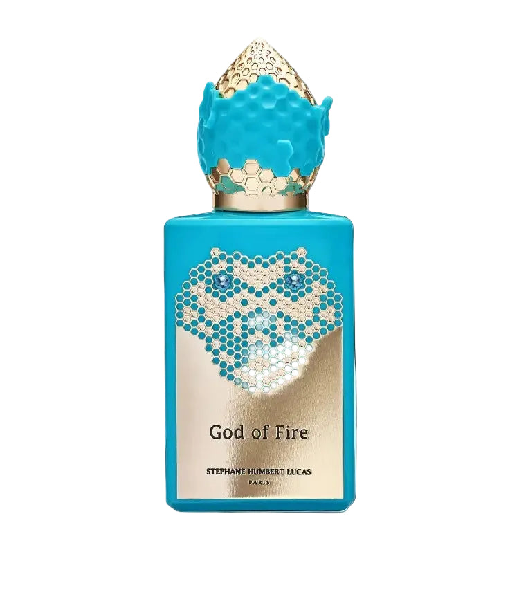 blue perfume bottle with gold accents on a white background