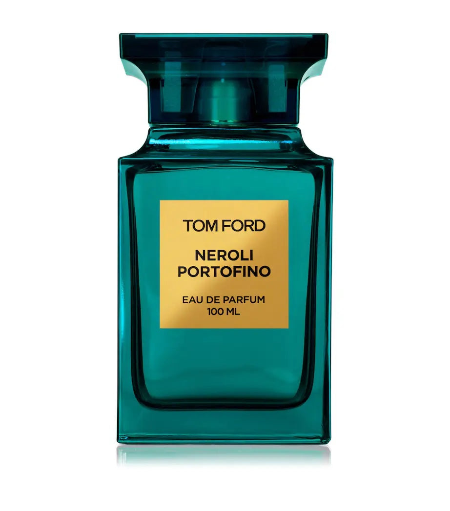blue tom ford neroli portofino bottle with a blue cap and a gold label on a white background